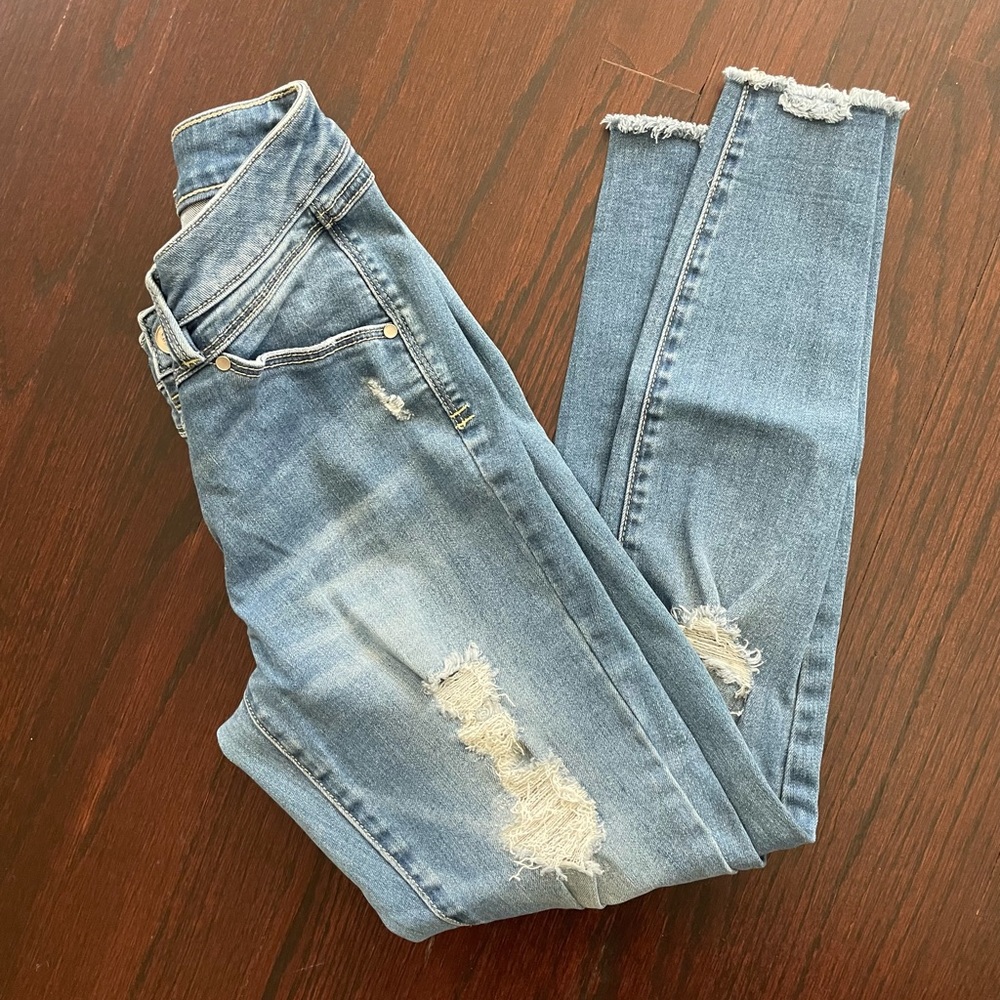 Bebe distressed jeans 26 light wash